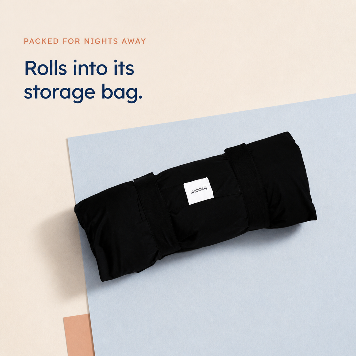 Goose Down Mini Children’s Pillow rolled into its storage bag